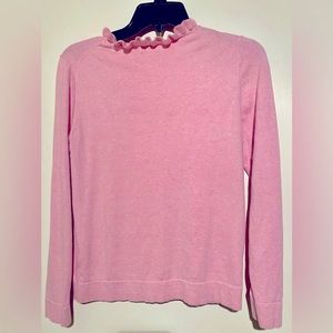 J. Crew pink ruffled sweater.